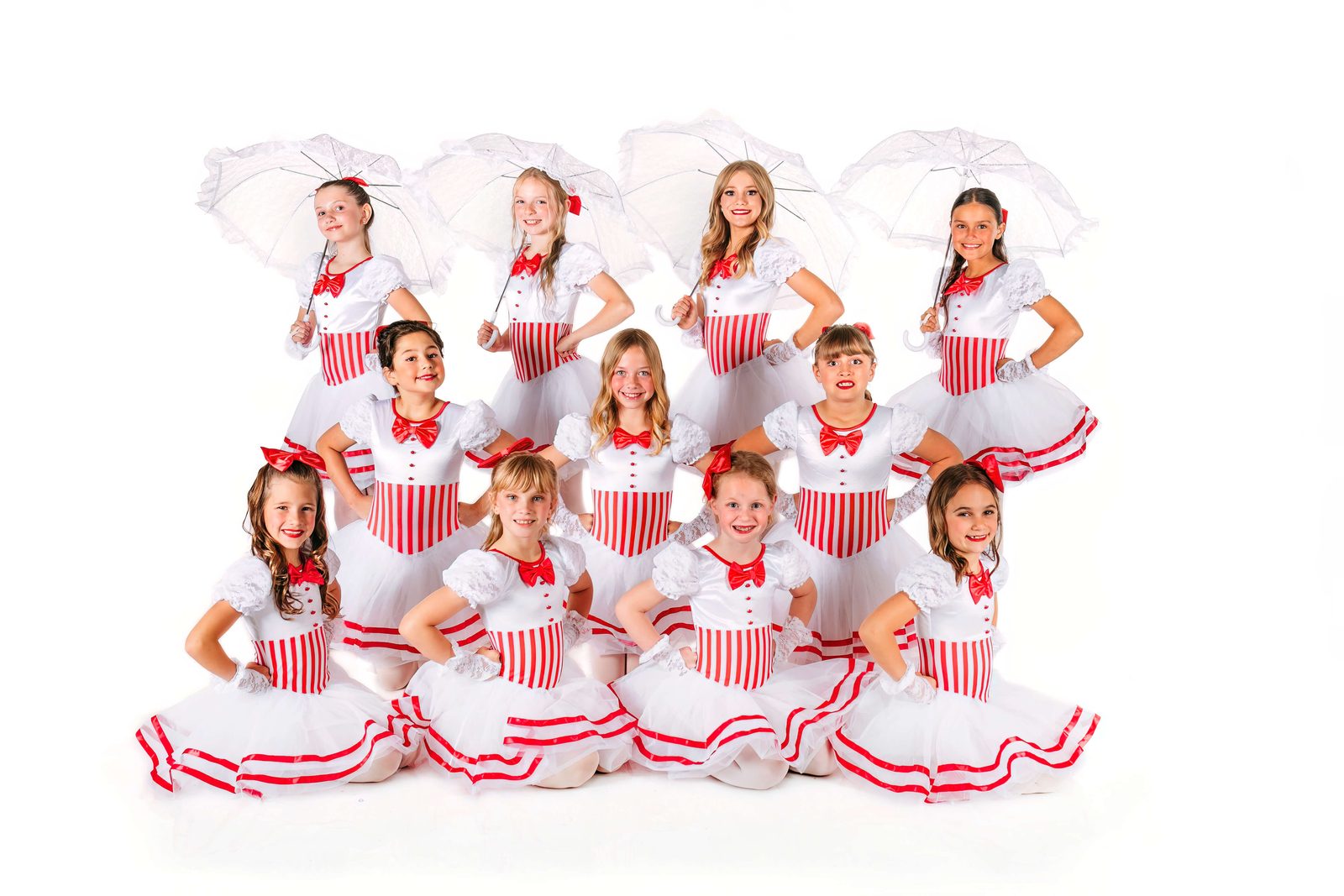J&M Dance Center young dancers in costume with parasols